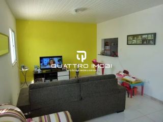 Casa em via pública no bairro Aruana