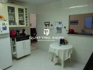 Casa em via pública no bairro Aruana