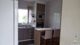 Casa à venda com um terreno de 1.226,78m² em Penha, com 01 casa contendo 02 dormitórios e garagem coberta para 3 carros. Ref 300