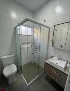 Casa geminada semi-mobiliada para vender aprox. 700m da Praia de Armação do Itapocory em Penha. Ref 347