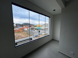 Sobrado Para Vender com 2 suítes no bairro Praia da Armação em Penha - SC. Ref. 356
