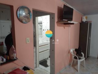 Casa à venda com 2 suítes em um terreno de 525m² em Balneário Piçarras. Ref. 400