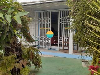 Casa à venda com 2 suítes em um terreno de 525m² em Balneário Piçarras. Ref. 400