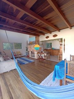 Casa à venda à aprox. 100m da Praia Grande com vista deslumbrante para o mar e loft com acesso individual! Ref. 401