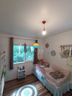 Casa à venda à aprox. 100m da Praia Grande com vista deslumbrante para o mar e loft com acesso individual! Ref. 401