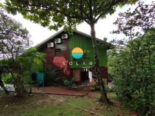 Casa Com Vista Ampla Para o Mar à Venda, com 3 dormitórios em um terreno de 980m², a aprox. 280m da Praia Grande em Penha/SC. Ref. 442