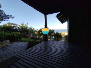 Casa Com Vista Ampla Para o Mar à Venda, com 3 dormitórios em um terreno de 980m², a aprox. 280m da Praia Grande em Penha/SC. Ref. 442