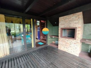 Casa Com Vista Ampla Para o Mar à Venda, com 3 dormitórios em um terreno de 980m², a aprox. 280m da Praia Grande em Penha/SC. Ref. 442