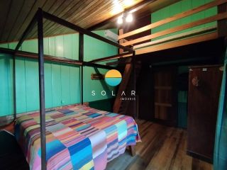 Casa Com Vista Ampla Para o Mar à Venda, com 3 dormitórios em um terreno de 980m², a aprox. 280m da Praia Grande em Penha/SC. Ref. 442