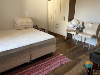 Terreno de 550m² com 2 casas, com possibilidade de renda extra na Praia da Armação em Penha/SC. Ref. 460