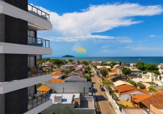 Terreno de 256,45m² com projeto aprovado, aprox. 440m da Praia do Quilombo em Penha/SC. Ref. 501