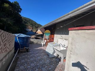 Casa principal mais duas casas! Oportunidade de renda extra! na Armação em Penha /SC. Ref.504