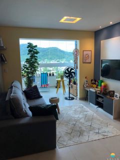 Apartamento Frente mar, aprox. 70m da praia com 2 suítes na Praia de Armação do Itapocory em Penha. Ref. 102