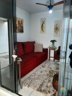 Casa com 03 suítes e área de festas com piscina aprox. 352m da Praia de Armação em Penha/SC. Ref. 107