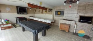 Casa com 03 suítes e área de festas com piscina aprox. 352m da Praia de Armação em Penha/SC. Ref. 107