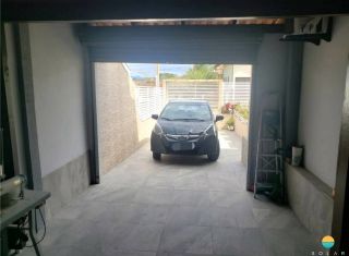 Sobrado 04 dormitórios e 04 vagas de garagens a 700m da praia de Armação em Penha-SC. Ref. 240