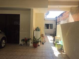 Casa com 2 dormitórios à venda, no nível da rua mais 2 casas no fundo mais terreno, 166 m² por R$ 650.000 - Laranjeiras - Caieiras/SP