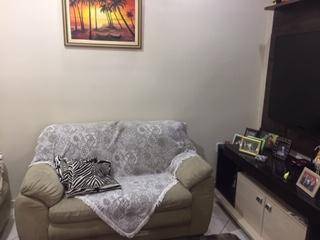 Casa com 2 dormitórios à venda, no nível da rua mais 2 casas no fundo mais terreno, 166 m² por R$ 650.000 - Laranjeiras - Caieiras/SP