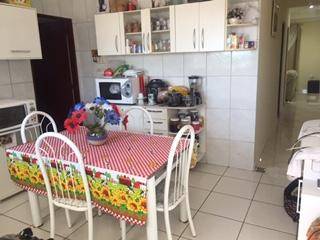 Casa com 2 dormitórios à venda, no nível da rua mais 2 casas no fundo mais terreno, 166 m² por R$ 650.000 - Laranjeiras - Caieiras/SP
