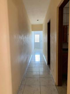 Casa com 2 dormitórios à venda, no nível da rua mais 2 casas no fundo mais terreno, 166 m² por R$ 650.000 - Laranjeiras - Caieiras/SP