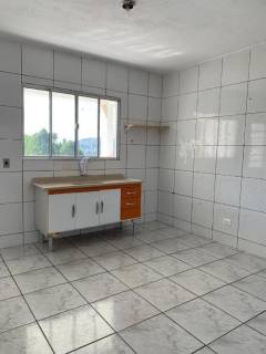 Casa com 2 dormitórios à venda, no nível da rua mais 2 casas no fundo mais terreno, 166 m² por R$ 650.000 - Laranjeiras - Caieiras/SP