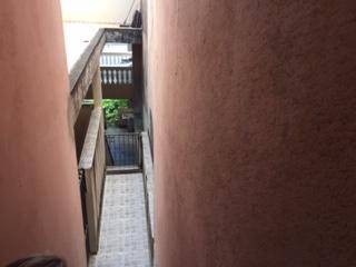 Casa com 2 dormitórios à venda, no nível da rua mais 2 casas no fundo mais terreno, 166 m² por R$ 650.000 - Laranjeiras - Caieiras/SP