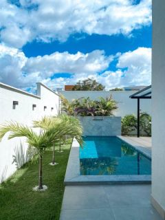 Casa duplex de 398m² com 5 suítes + espaço gourmet no Condomínio Alphaville