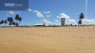 Lote em condomínio à beira mar