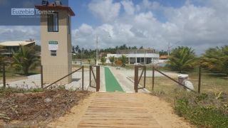 Lote em condomínio à beira mar