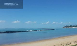 Lote em condomínio à beira mar