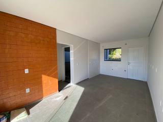 Casa na praia com um amplo terreno