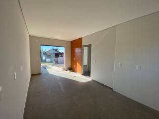 Casa na praia com um amplo terreno