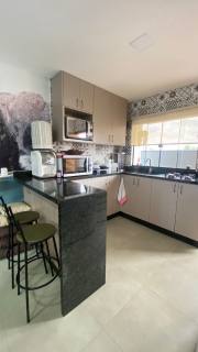 Sobrado com piscina na praia com um valor especial