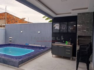 LINDA CASA COM PISCINA E CHURRASQUEIRA, COM 2 QUARTOS SENDO 1 SUITE,SALA,COZINHA E AREA DE SERVIÇO COBERTA