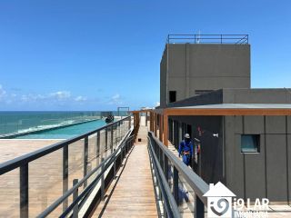 Vista Mar em Alto Padrão: Seu Novo Studio Mobiliado na Orla de Armação!