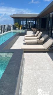 Viva no Topo da Vitória: Studio de Luxo com Rooftop e Vista Panorâmica!