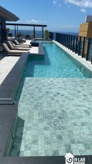 Viva no Topo da Vitória: Studio de Luxo com Rooftop e Vista Panorâmica!