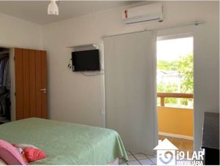 Espaço e Sustentabilidade a 150m da Praia: Casa com 5 Quartos, Suíte Térrea e Energia Solar em Jaguaribe