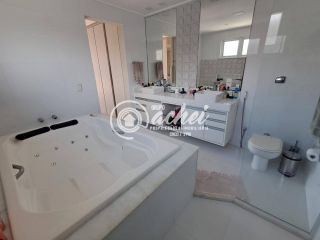 Casa de condomínio 4/4 porteira fechada à venda no Alphaville Litoral  Norte 1