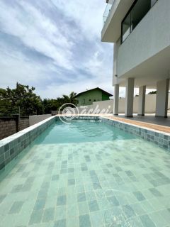 Casa de condomínio 4/4 nascente à venda no Alphaville Litoral Norte 2