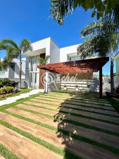 Casa moderna nascente 4/4 com energia solar à venda no Alphaville Litoral Norte 1