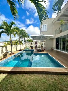 Casa moderna nascente 4/4 com energia solar à venda no Alphaville Litoral Norte 1