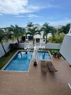 Casa moderna nascente 4/4 com energia solar à venda no Alphaville Litoral Norte 1