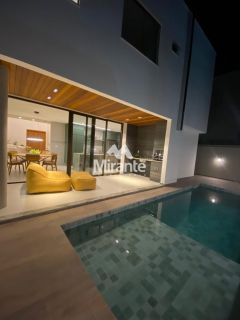 Casa de Condomínio Para Vender com 4 quartos sendo 4 suítes no bairro Papagaio em Feira De Santana