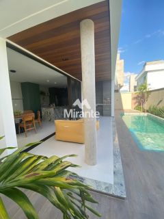 Casa de Condomínio Para Vender com 4 quartos sendo 4 suítes no bairro Papagaio em Feira De Santana