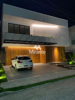 Casa de Condomínio Para Vender com 4 quartos sendo 4 suítes no bairro Papagaio em Feira De Santana