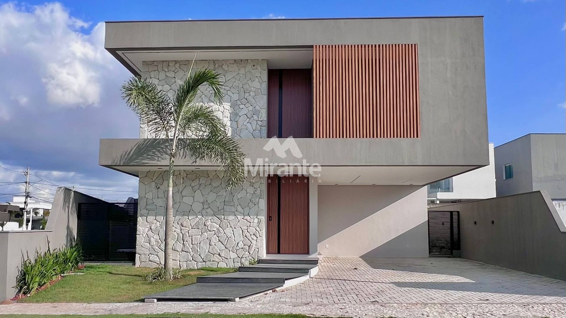 Casa de Condomínio Para Vender com 4 quartos sendo 4 suítes no bairro Papagaio em Feira De Santana