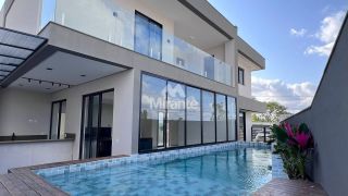 Casa de Condomínio Para Vender com 4 quartos sendo 4 suítes no bairro Papagaio em Feira De Santana