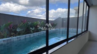 Casa de Condomínio Para Vender com 4 quartos sendo 4 suítes no bairro Papagaio em Feira De Santana