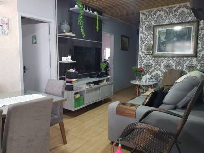 Casa com Edícula no Centro de Penha – Conforto e Exclusividade a 800m da Praia